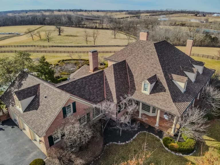 Pinnacle Roofing repair work on a residential shingle roof